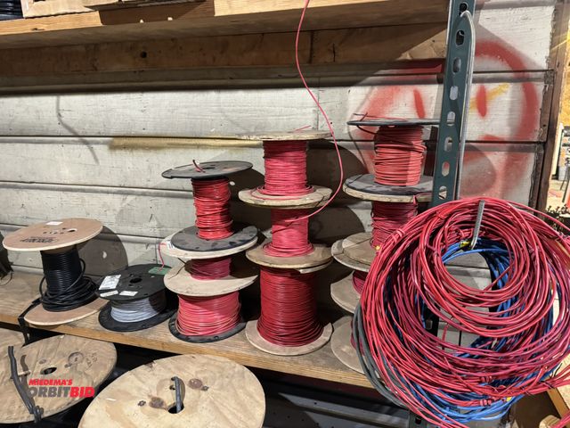 Lot 1-4375 - (12) spools of assorted alarm wire and cabling, 18/4, 16/2, and much more, winning bidder responsibl...