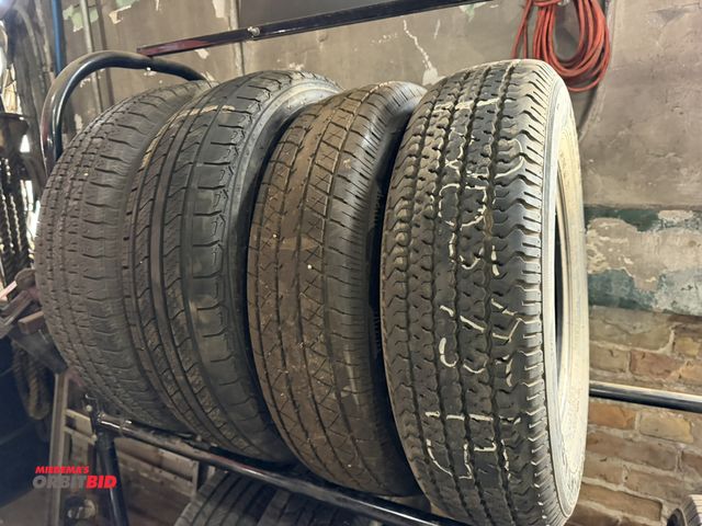 Lot 1-1276 - Lot of 4 different 15" tires, includes (1) Karrier Load-Star size ST205/75R15, (1) Rainier ST size 2...