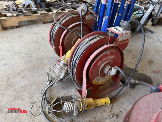 Lot 1-1348 - Lot of (2) Reelcraft, model L 4050 163 1, retractable electric cord reels with lights (120V), workin...