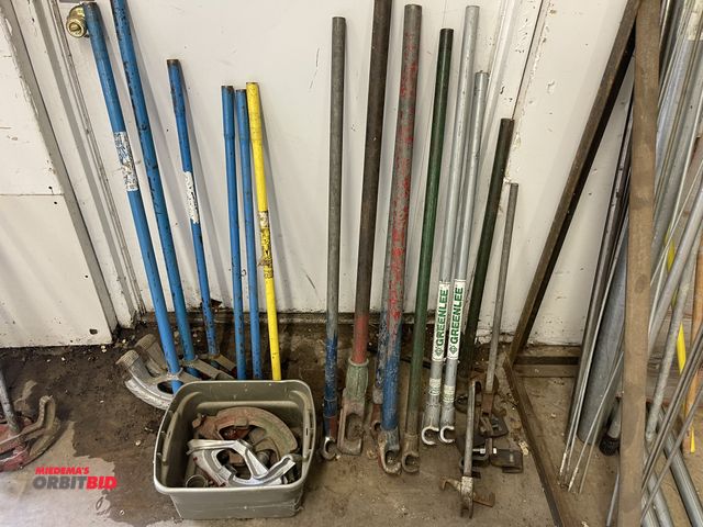 Lot 1-6157 - Large lot of assorted conduit benders, includes Greenlee, Ideal, and extra handles and heads.