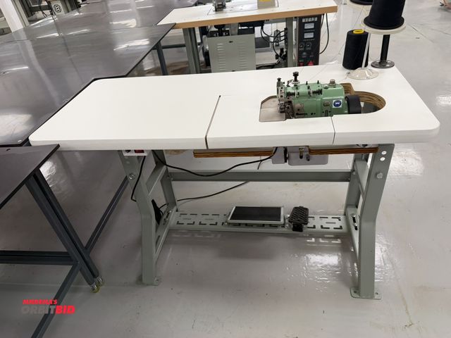 Lot 1-4867 - (1) Merrow, model MG-3DW-2, over seaming sewing machine, S/N 309139, includes power table, foot peda...
