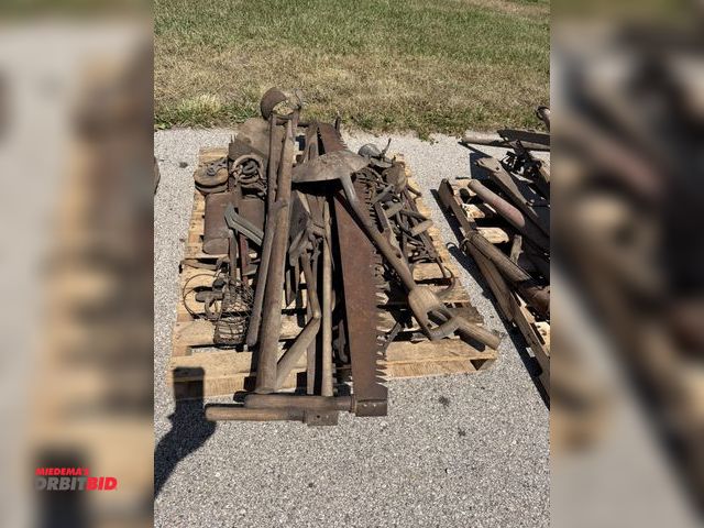 Lot 1-18078 - Skid lot of assorted vintage/antique hand tools, includes 2-man saws, planters, blocks, post hole di...
