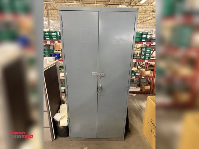 Lot 1-17531 - (1) 2-door metal cabinet, 36" wide x 24" deep x 78.5" tall with contents of assorted paper organizer...