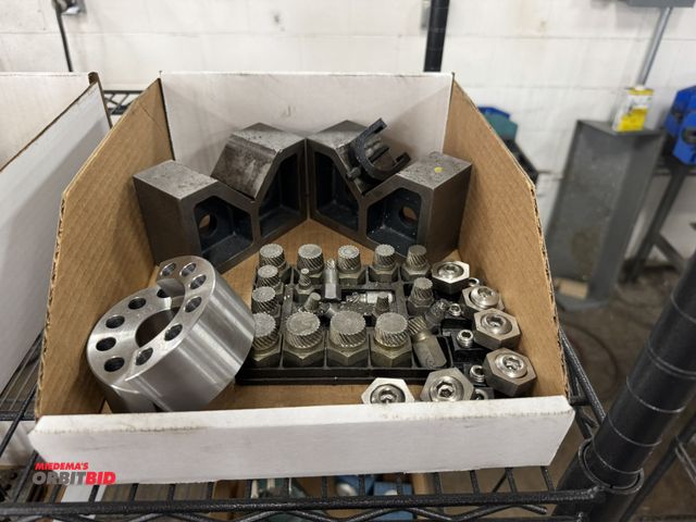 Lot 1-2394 - Lot of assorted Easy Outs, (2) 5" V-blocks, 2" wide x 3" tall, and more.