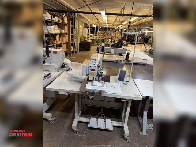 Lot 1-4718 - (1) Robeson NT-1010G programmable pattern sewing machine, with power table, 47" wide x 23.5" deep x ...