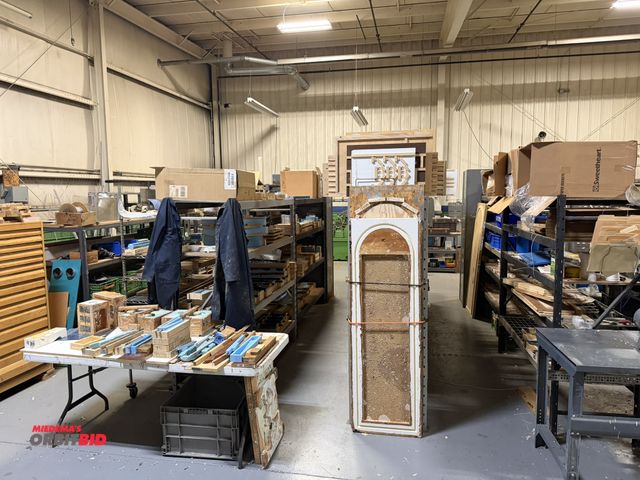 Lot 1-18630 - Contents of all molds and all items on 2 racks, winning bidder responsible for proper removal of all...