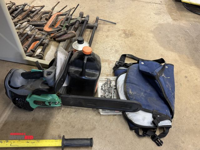 Lot 1-6322 - (1) Hitachi CS33ET chainsaw with 14" bar, chaps, bar oil, and premixed non-ethanol fuel.