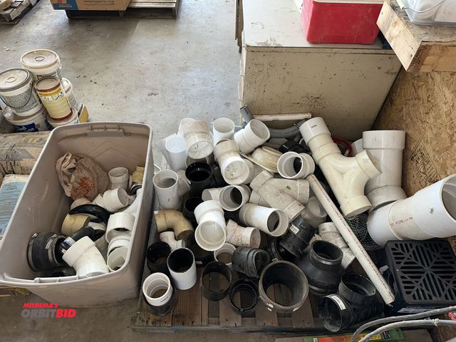 Lot 1-14130 - Large lot of assorted PVC pipe, drain pipe, fittings, and miscellaneous other items.