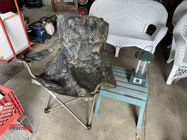 Lot 1-632 - Lot of (3) collapsible outdoor camouflage camp chairs (2 with canvas bag), (1) American Camper fluor...