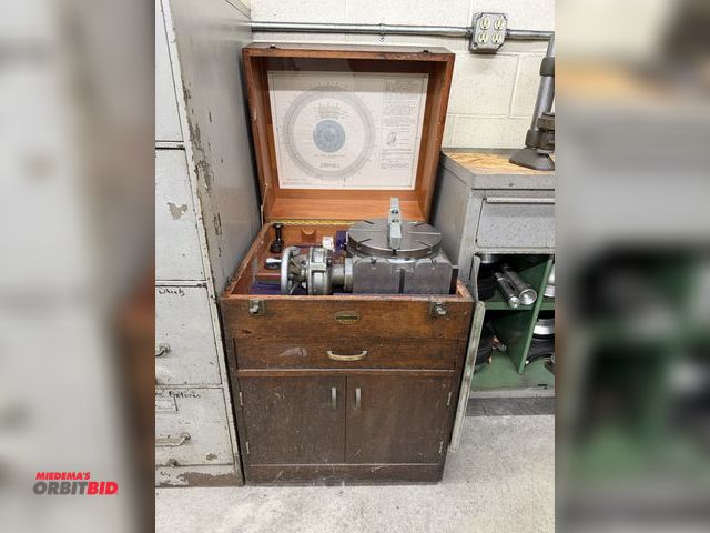Lot 1-1788 - (1) Moore Precision rotary table, includes wood cabinet with assorted attachments, parts, S/N LRT163...