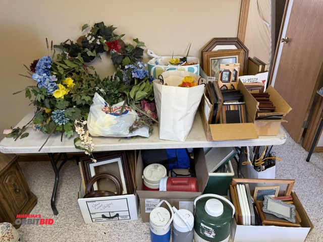 Lot 1-19214 - Large lot of assorted picture frames, artificial flowers, thermoses, small cooler, and much more.