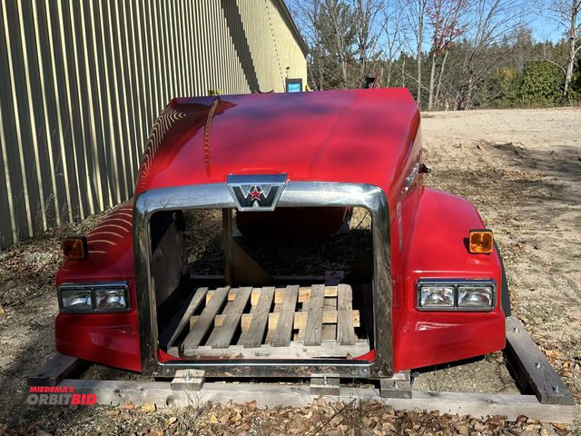 Lot 1-15053 - (1) fiberglass hood for a Western Star 4900 set back axle semi tractor.