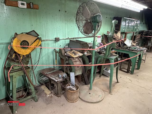 Lot 1-18479 - Large lot of assorted items for parts only, includes tumblers, manual kick press, pedestal fan, heav...