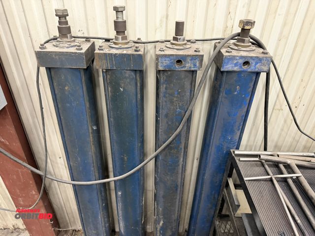 Lot 1-15395 - Lot of (4) heavy air cylinders, approx. 52", conditions are unknown.