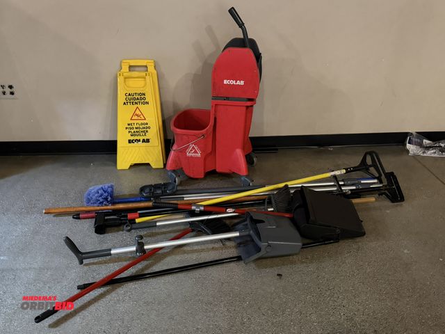 Lot 1-11199 - (1) Ecolab mop bucket with ringer, (2) folding A-framed 24" tall cautin wet floor signs, mops (no he...