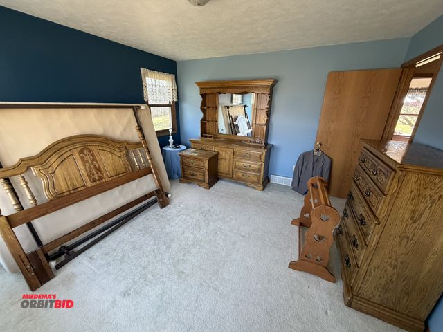 Lot 1-19193 - Contents of bedroom, includes queen size bed with headboard and rail, (1) dresser with mirror, appro...