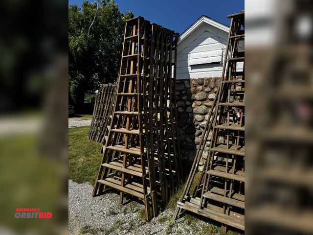 Lot 1-6980 - Lot of (8) 10' wood orchard ladders.