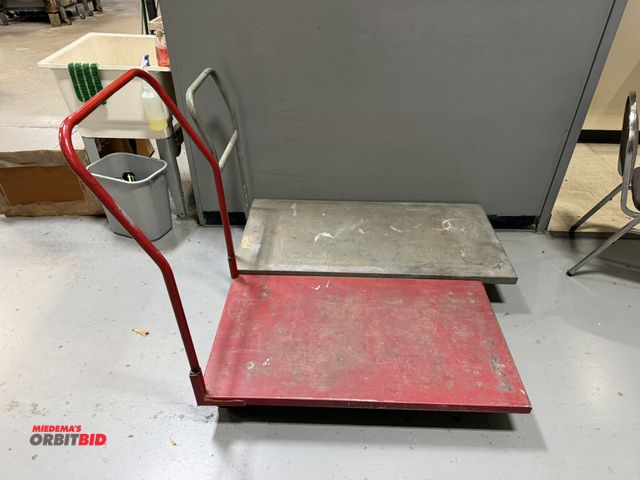 Lot 1-18701 - (1) steel product cart, 42" long x 24" wide, and (1) Little Giant metal product cart, 48" x 24" wide...