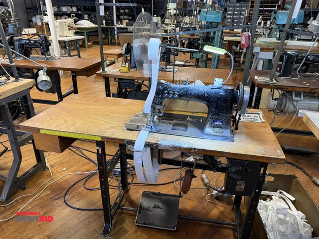 Lot 1-4681 - (1) Singer, model 131WSV17, commercial sewing machine with a Singer power table, easy clutch motor, ...