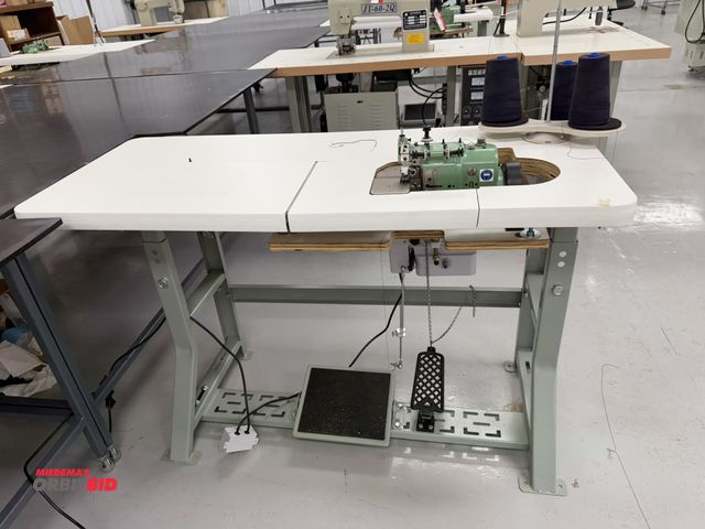 Lot 1-4873 - (1) Merrow, model MG-3DW-2, over seaming sewing machine, S/N 309139, includes power table, foot peda...