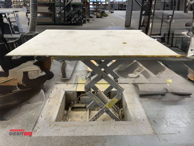 Lot 1-16879 - (1) American Lifts, 1000 lb. capacity electric over hydraulic table lift, foot pedal controls, has 4...