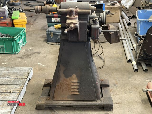 Lot 1-1161 - (1) vintage brake lathe with a single phase electric motor, no other info available.