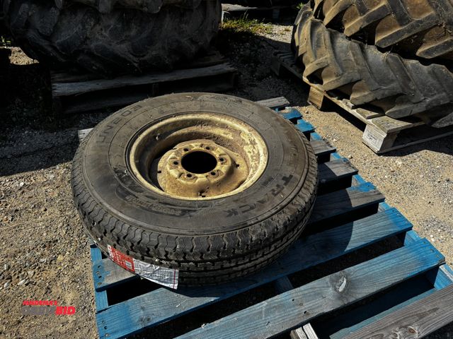 Lot 1-6984 - (1) Master Track ST235-80R16 tire on 6-bolt rim, 10-ply rating, new tire, winning bidder responsible...