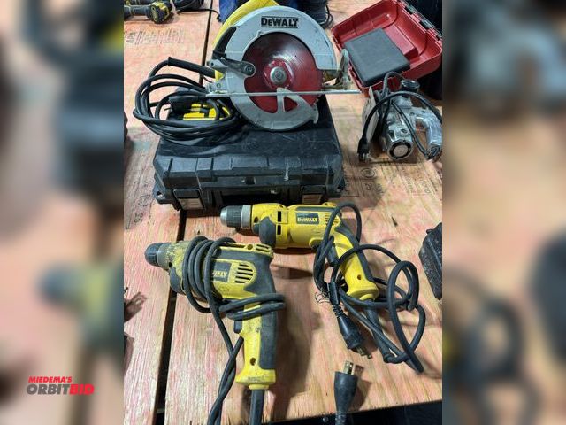 Lot 1-16427 - Lot of assorted DeWalt power tools, includes (2) 3/8" drills, model DWD110, (1) DeWalt 7 1/4" circul...