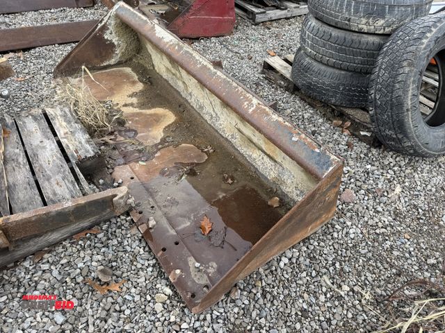Lot 1-16035 - (1) 6.5' bucket for skid steer, attachment plate area is bent, unit is missing BOCE.