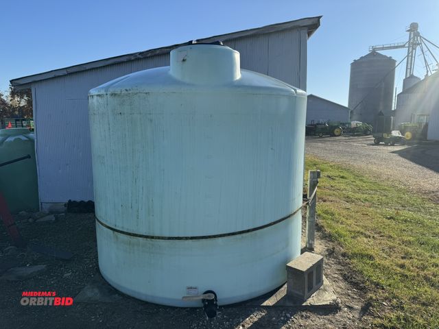 Lot 1-18108 - (1) 2500 gallon poly tank with shut off valve, previously held 1034O fertilizer in it, winning bidde...
