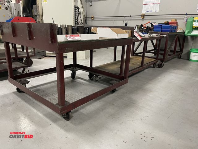Lot 1-19451 - Lot of (3) heavy duty steel tables with wood tops, 72" x 36", 72" x 31", 48" x 48", does not include...