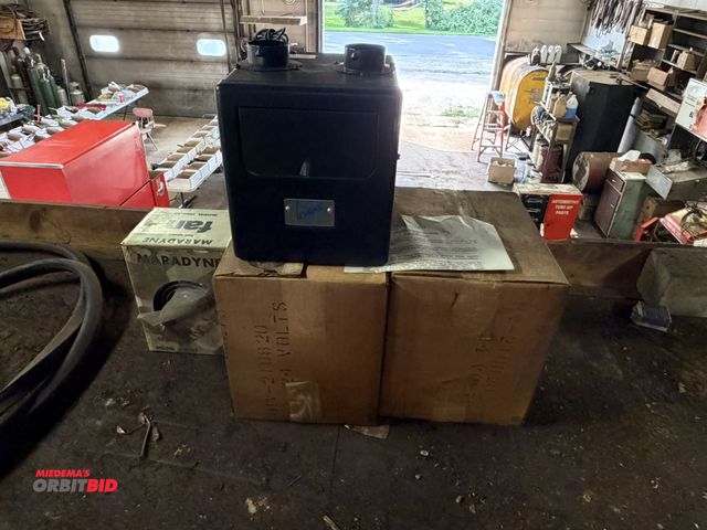 Lot 1-18611 - (1) Evans inline heater core, 24V, new in box.