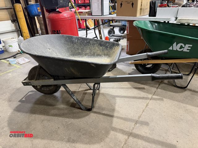Lot 1-18615 - (1) single wheel wheelbarrow with poly tray with metal handles.
