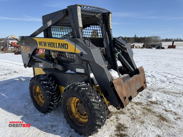 Lot 1-11762 - New Holland L170 Skid Steer (1) New Holland L170, Product ID #N8M487226, 10-16.5 tires, open cab, fo...