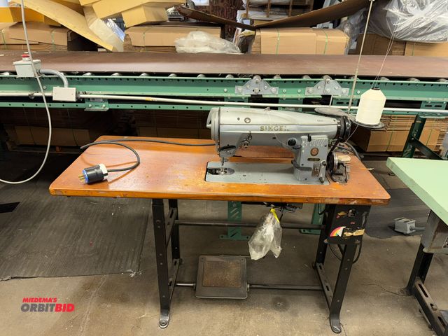 Lot 1-4743 - (1) Singer single needle sewing machine, model 457G105, power table, 48" wide x 21" deep x 30" tall,...