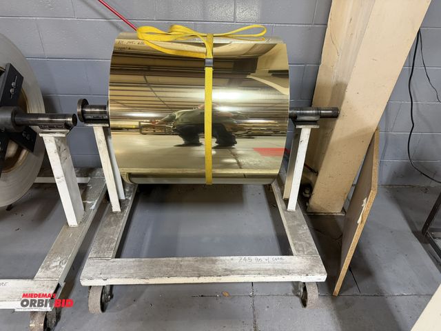 Lot 1-18707 - (1) 24" partial roll of anodized aluminum, .025" thickness, includes cart, net weight with aluminum ...