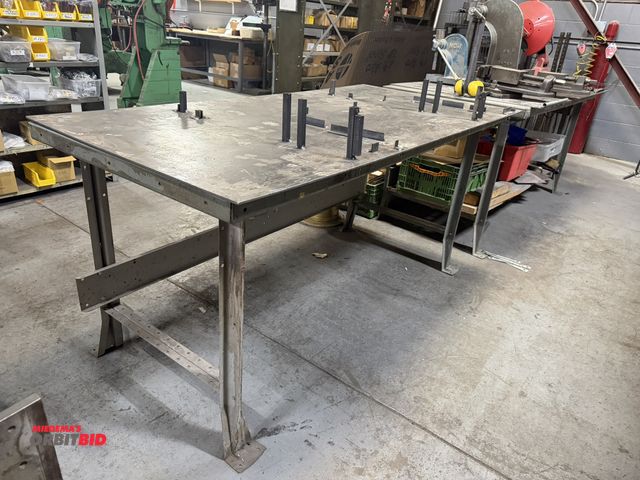 Lot 1-18533 - (2) steel 72" x 34" x 34" tall shop tables, each with 72" x 36" x 1/4" thick steel plate.