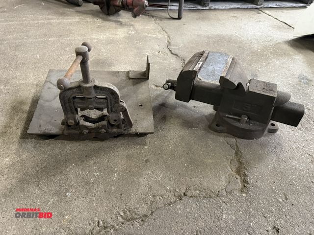 Lot 1-1155 - Lot including (1) Larin 5" bench vise with 12" x 10" steel plate that has a pipe vise mounted to it ...