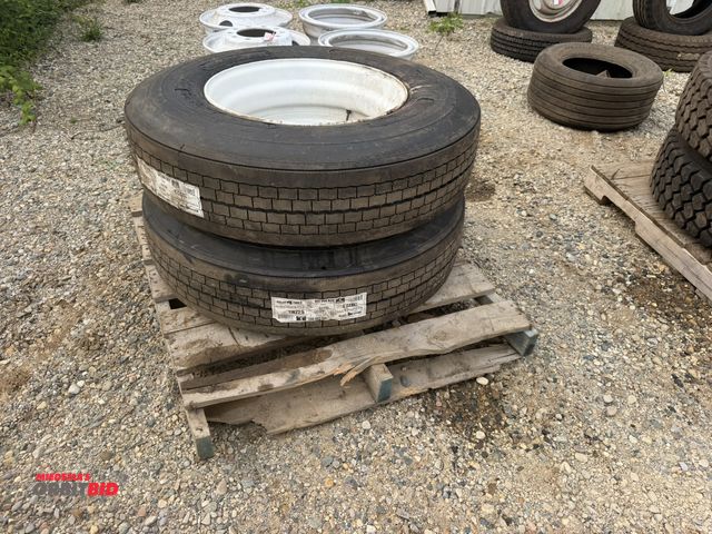 Lot 1-18262 - Lot of (2) new Kelly Armor Steel KTSA11R 225 tires with steel rims.
