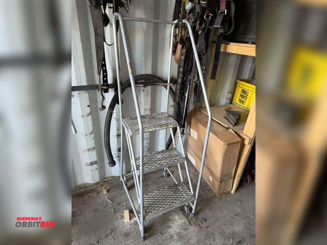 Lot 1-2994 - (1) 3-step warehouse safety ladder, and assorted harnesses.