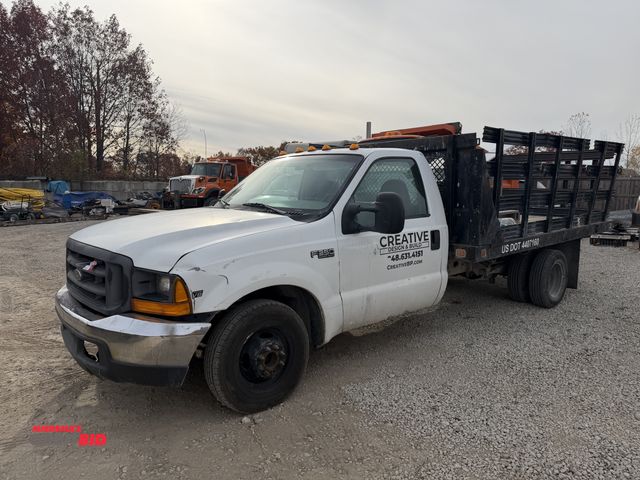 Lot 1-15917 - 1998 Ford  F350 Super Duty (1) single axle stake truck, automatic transmission, work type interior, ...