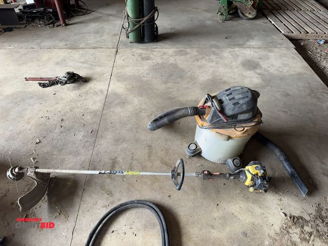 Lot 1-19912 - (1) Ridgid 5 HP, 12 gallon shop vac, and (1) John Deere T105S straight shaft string trimmer, engine ...