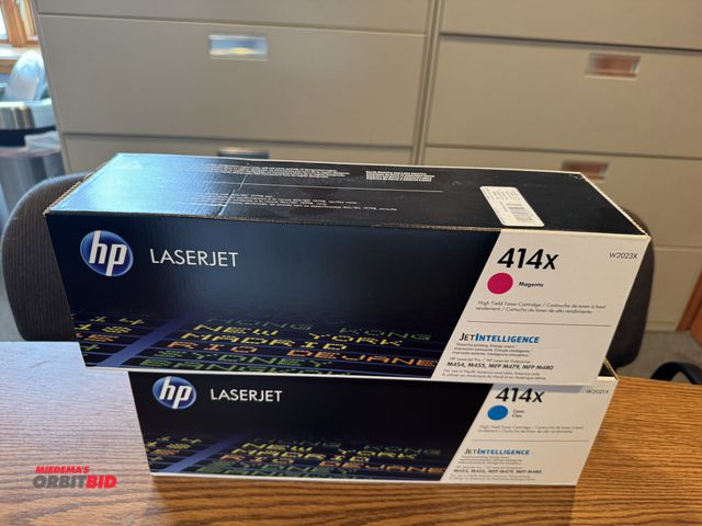 Lot 1-19587 - Lot of 2 new Hewlett Packard Laser Jet ink cartridges, includes (1) 414X magenta, and (1) 414X cyan.