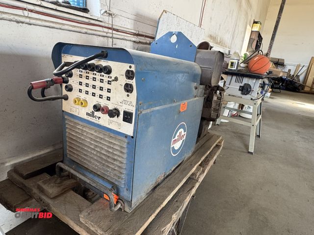 Lot 1-18132 - (1) Miller AC/DC welding generator, model AEAD-200LE, with Onan gas powered engine, includes cart, e...