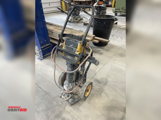 Lot 1-18833 - (1) DeWalt D25980 electric paver breaker, 120V, Type 4, includes cart, and (3) assorted bits, in wor...