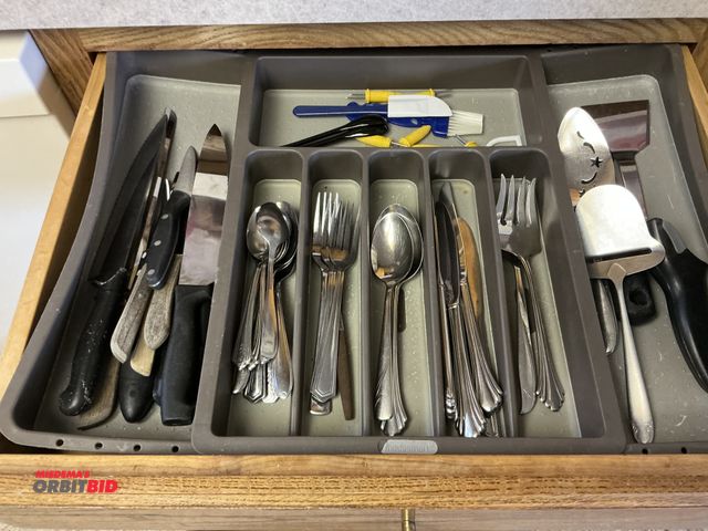 Lot 1-19320 - Contents of silverware drawer includes liner.
