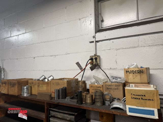 Lot 1-6382 - Items on top shelf of unit, including assorted HD flange nuts, steady rest bearings, brass, spindle ...