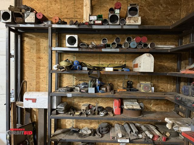 Lot 1-1502 - Entire contents of items shown on shelves in photo, includes various electrodes, ground clamps, wire...