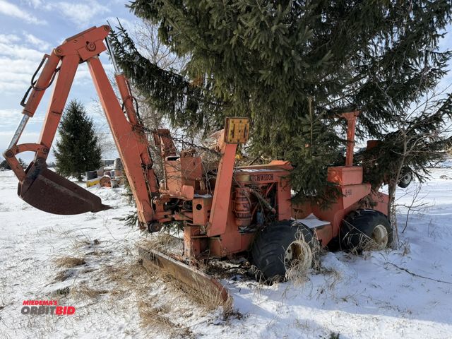 Lot 1-11524 - (1) Ditch Witch R60 trencher, 4WD, 72" wide plow, 4-cylinder gas engine, 12" wide 3-tine backhoe buc...