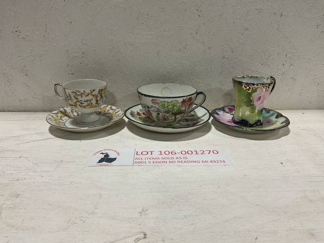 Lot 106-001270 - Three different size tea cups and matching plates. Slight wear on the plates and cups. Three differe...